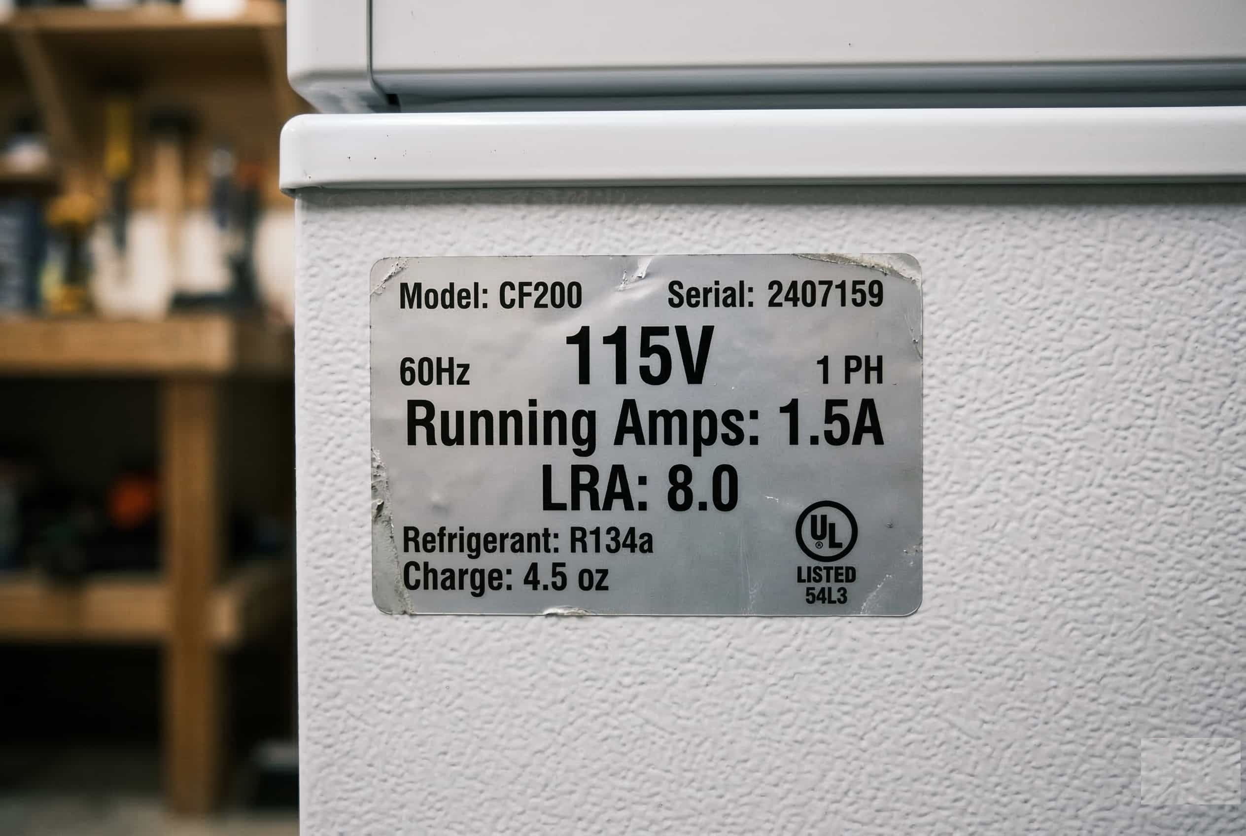 Close up of a refrigerator data plate showing the Locked Rotor Amps LRA rating